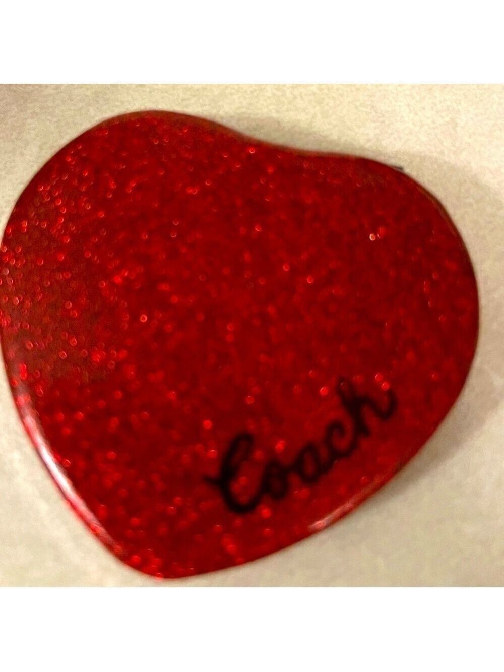 Coach compact mirror red with sparkles Mew straight from Coach.